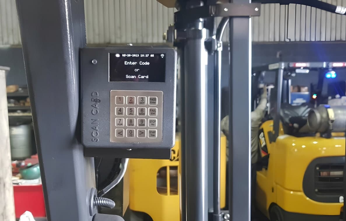 SM301 mounted on a forklift mast in a warehouse